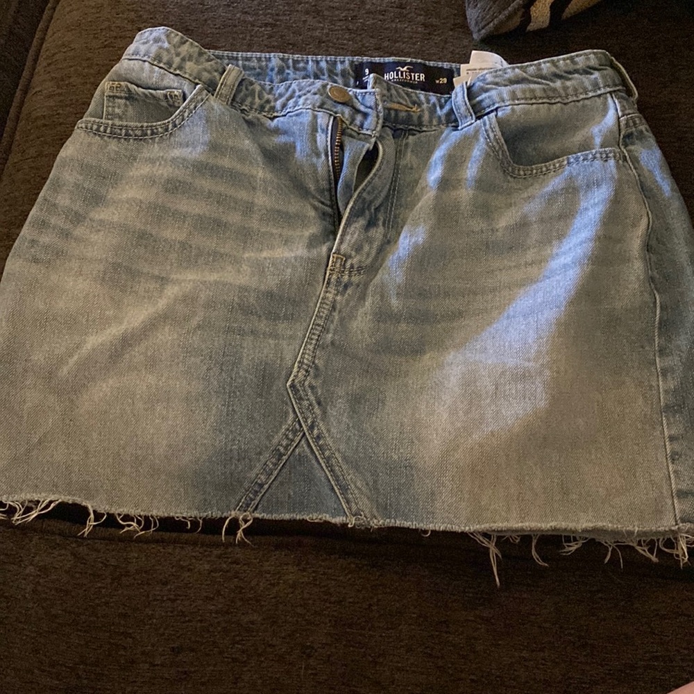 Hollister Jean skirt, w29. Light wash, frayed at the bottom.